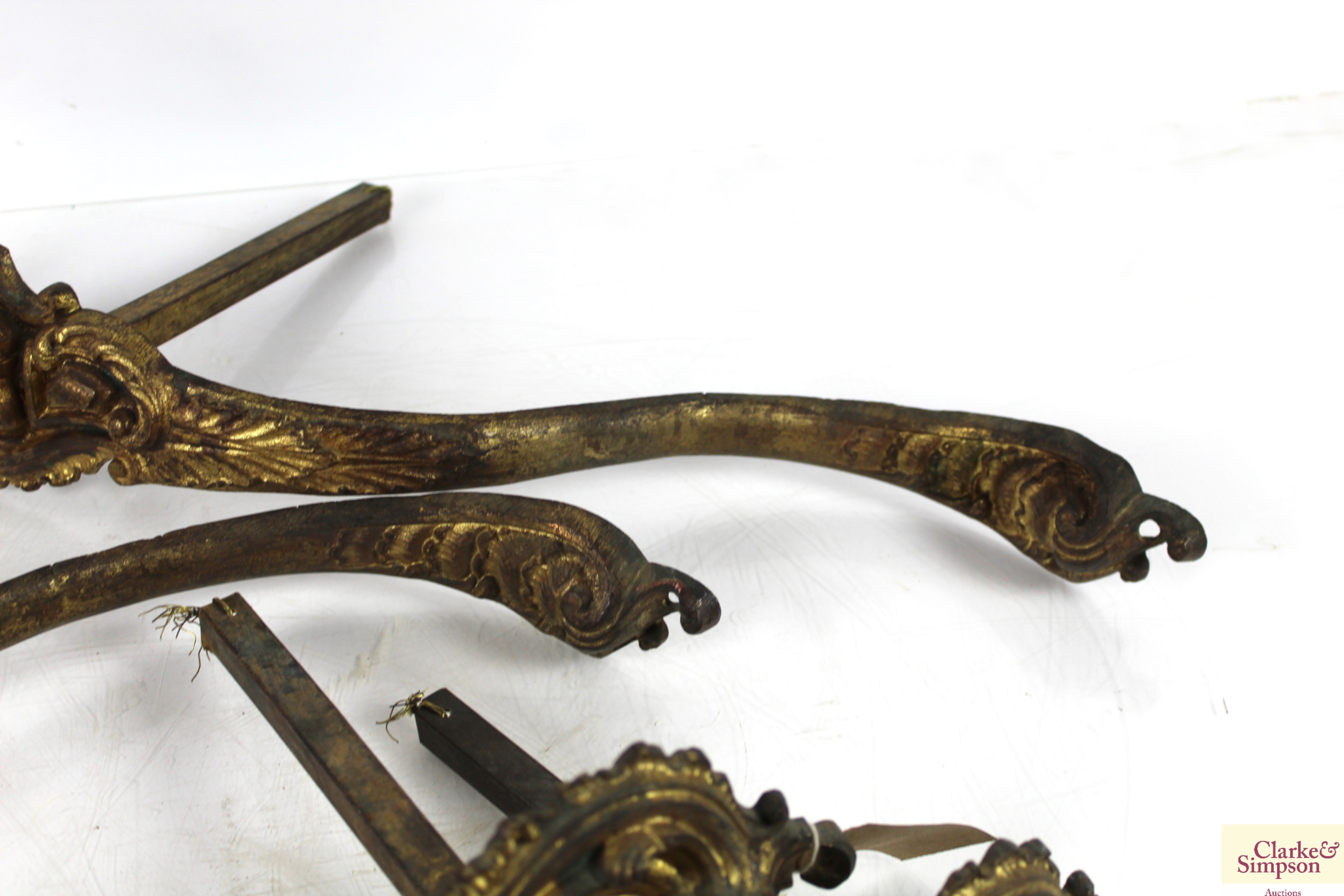 A set of four 19th Century gilded brass curtain ti - Image 3 of 5