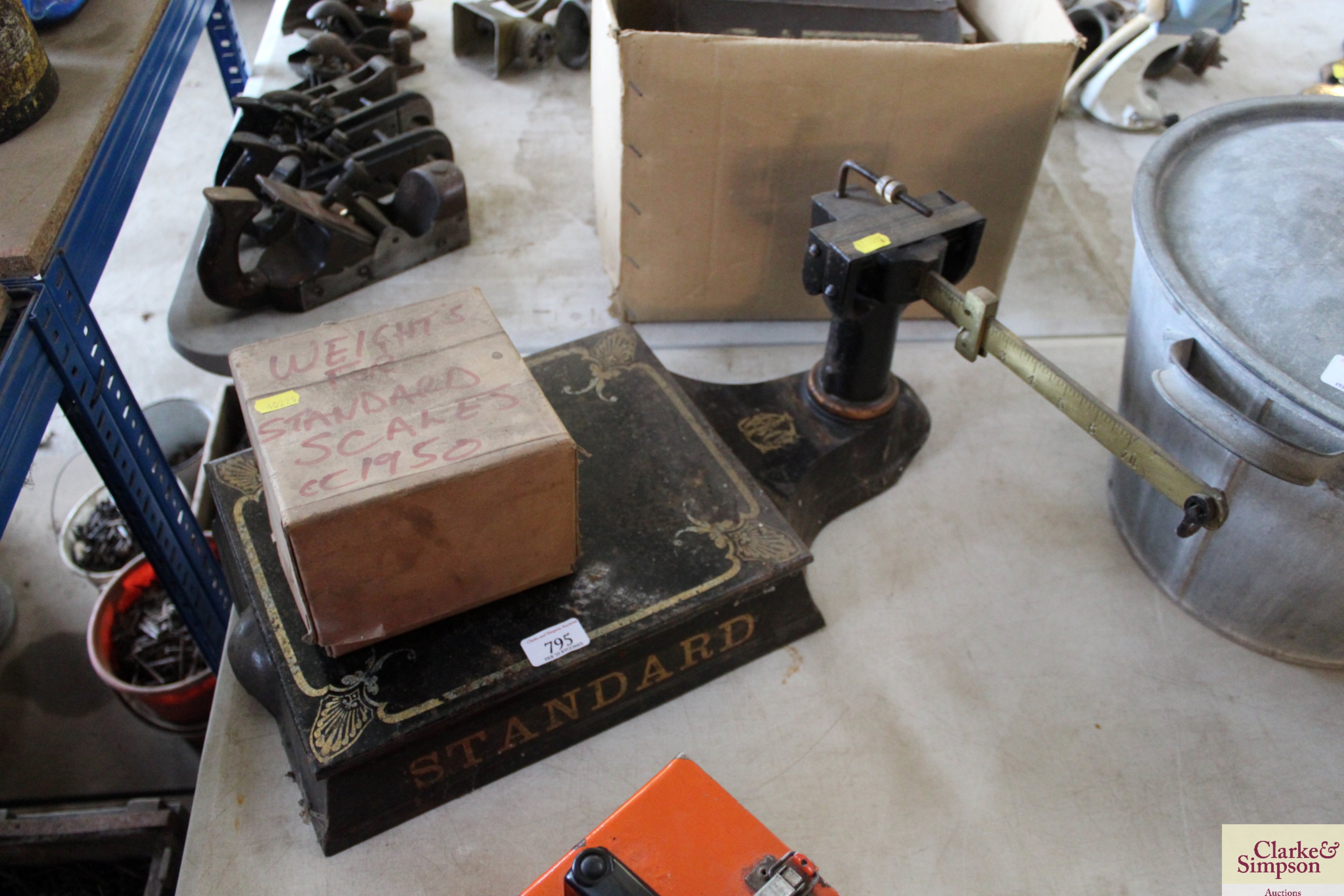 A set of Standard platform scales and weights circ