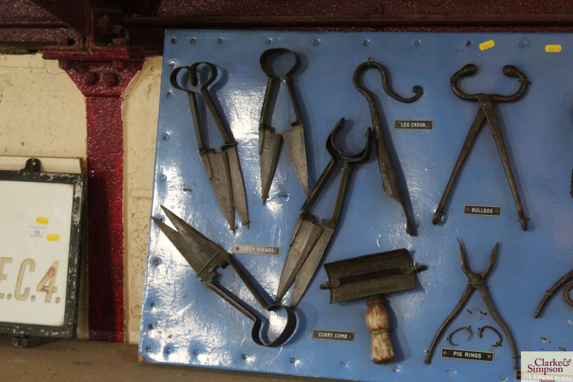 A large display board of Livestock items including sheep shears, pig rings, tooth rasp, anti - Image 2 of 4