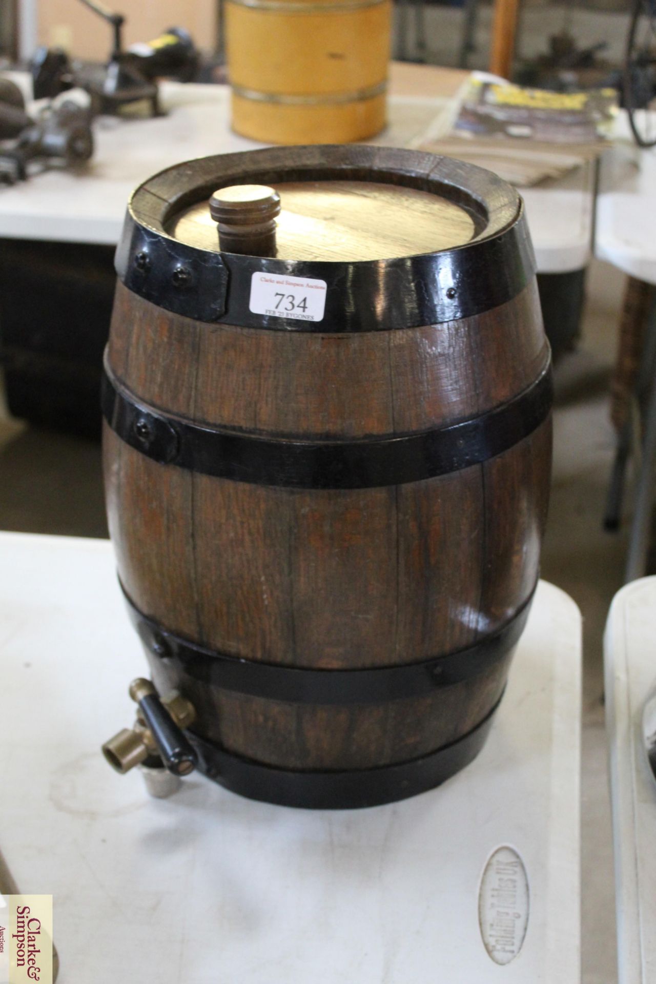 A small Sherry barrel with a brass tap