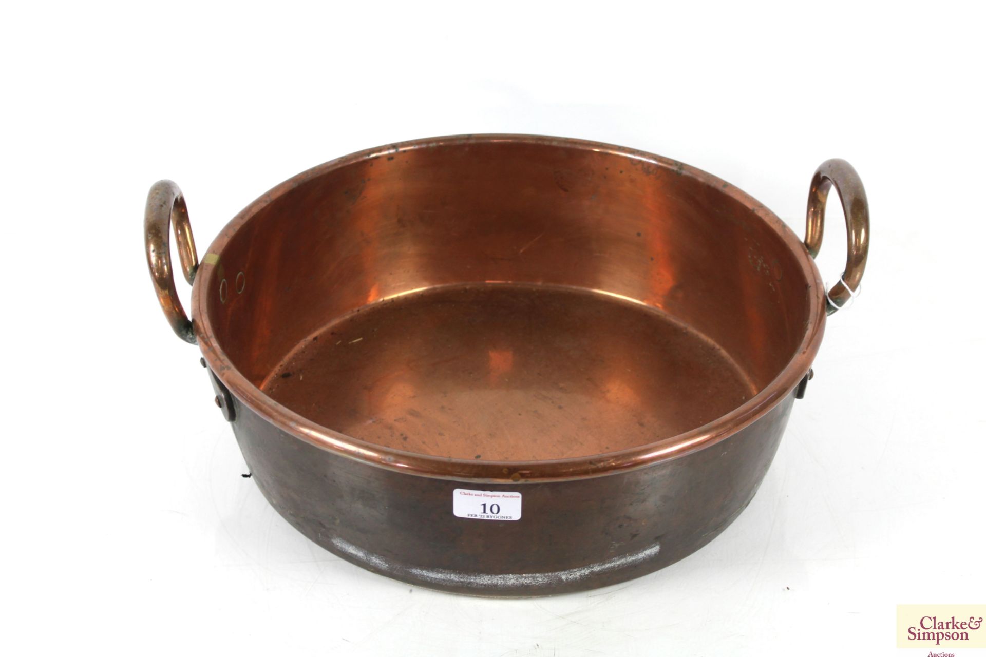 A Victorian copper jam pan