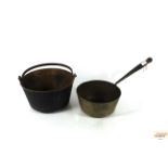 A brass jam pan and a brass long handled saucepan