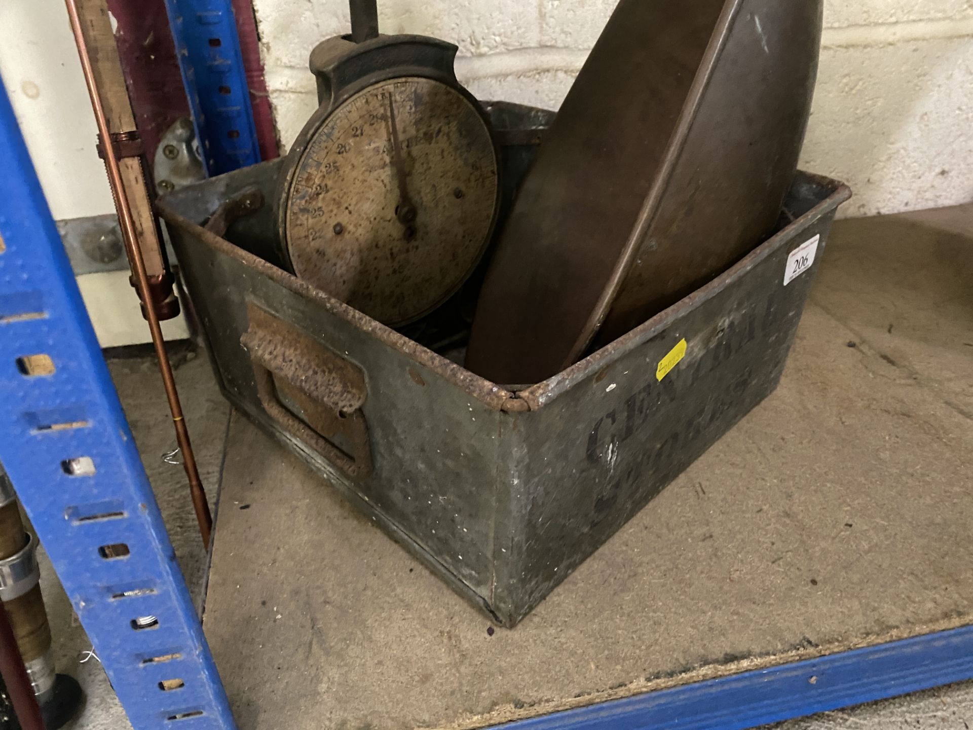 A Central Stores storage bin, scales