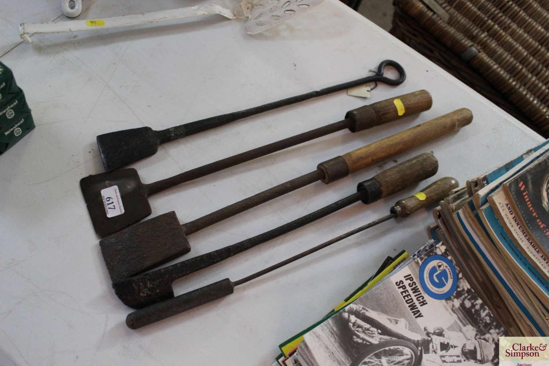 Four various docking irons and a goffering iron