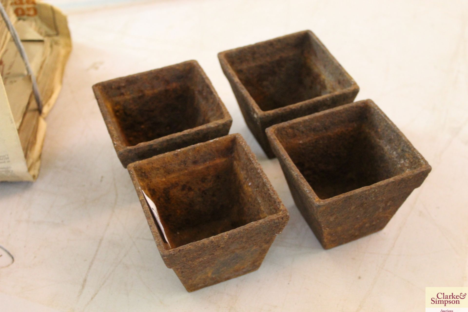 Four small cast iron pots - Image 2 of 2