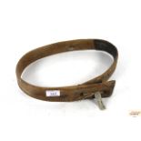 A vintage wooden calf collar