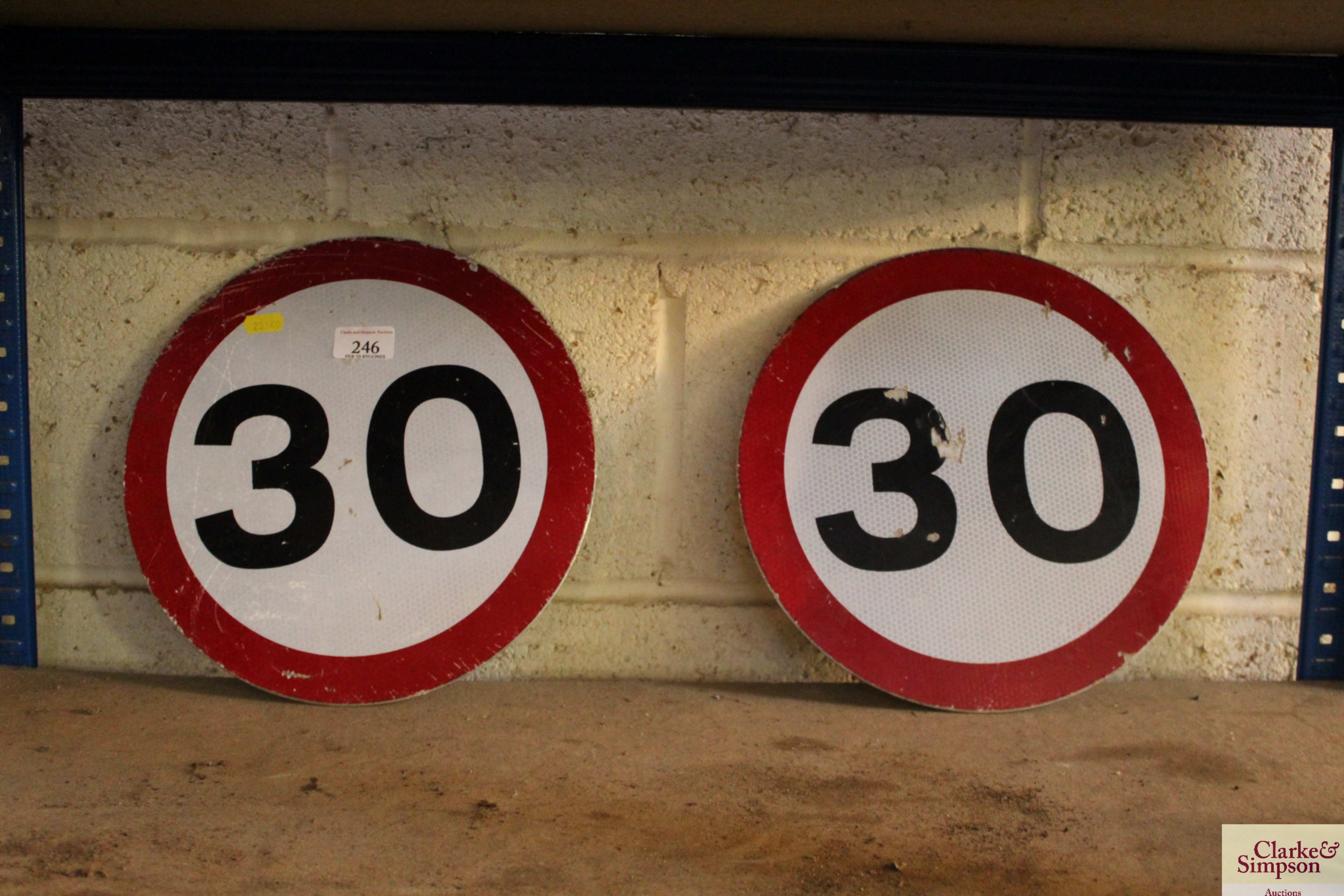 Two 30MPH reflective circular signs, approx. 12" d