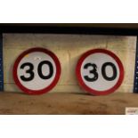 Two 30MPH reflective circular signs, approx. 12" d