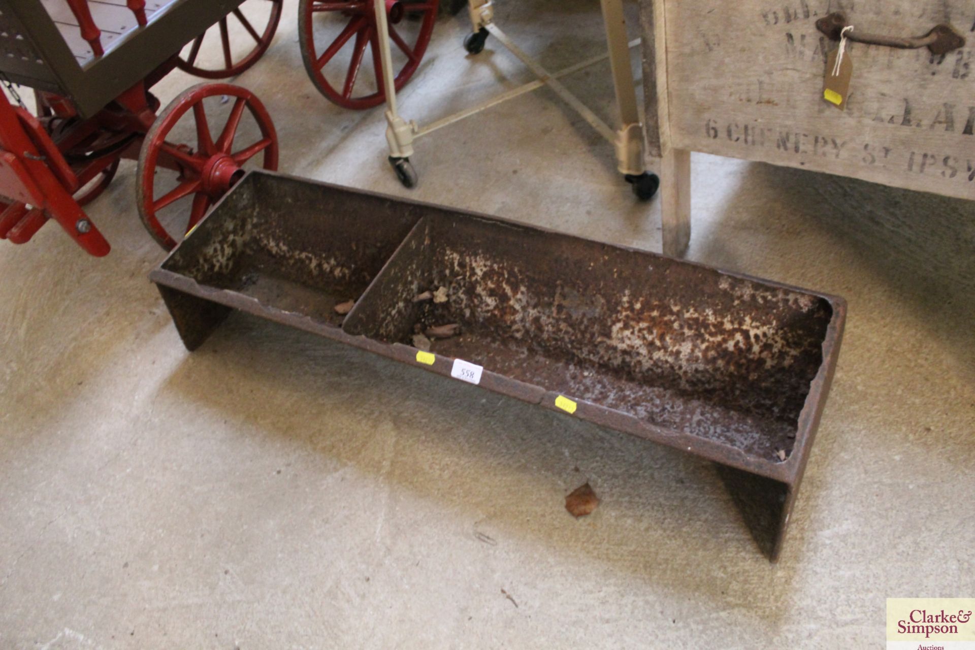 A cast iron trough approx. 38" long