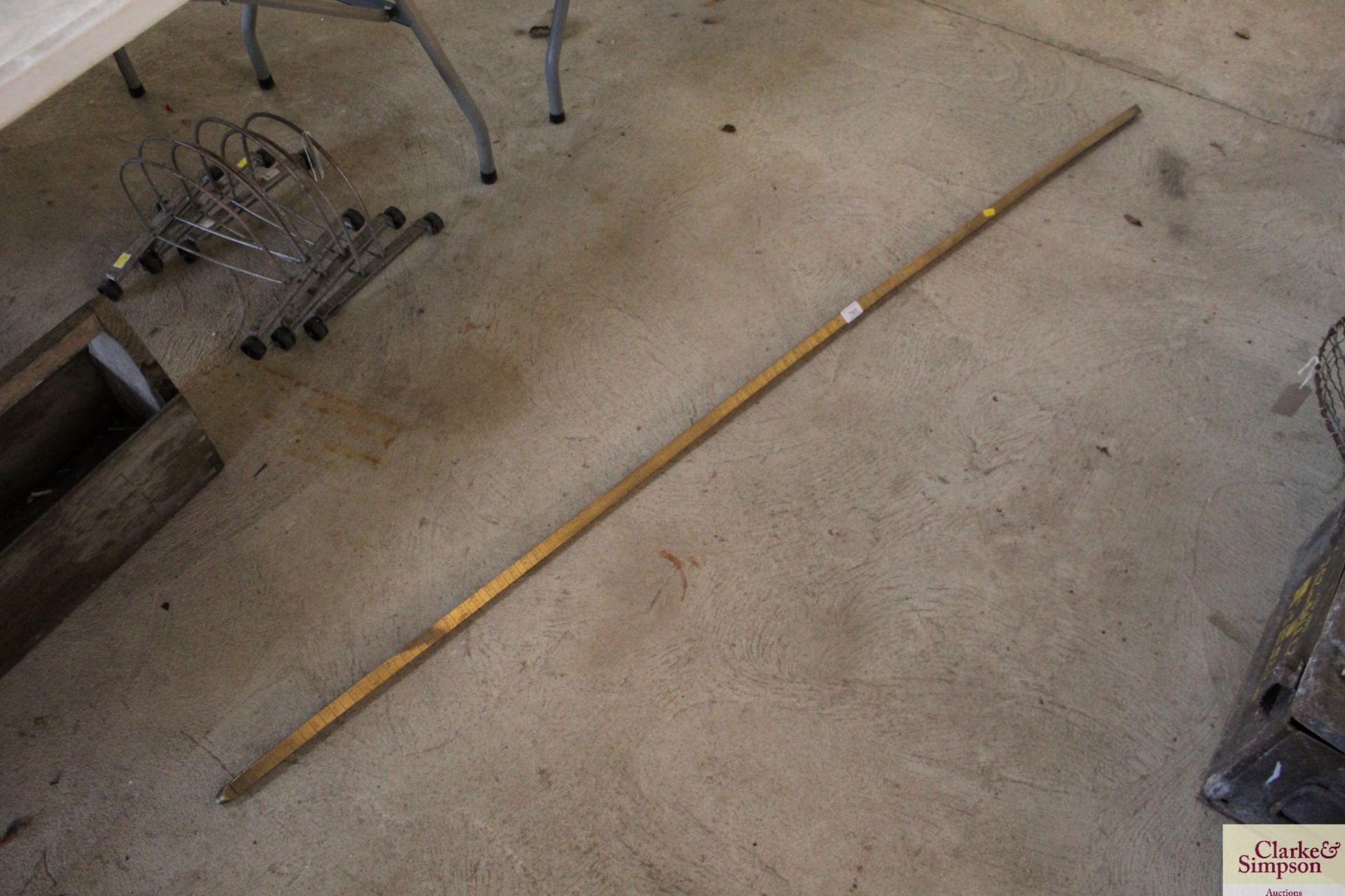 A brass tank fluid measuring stick