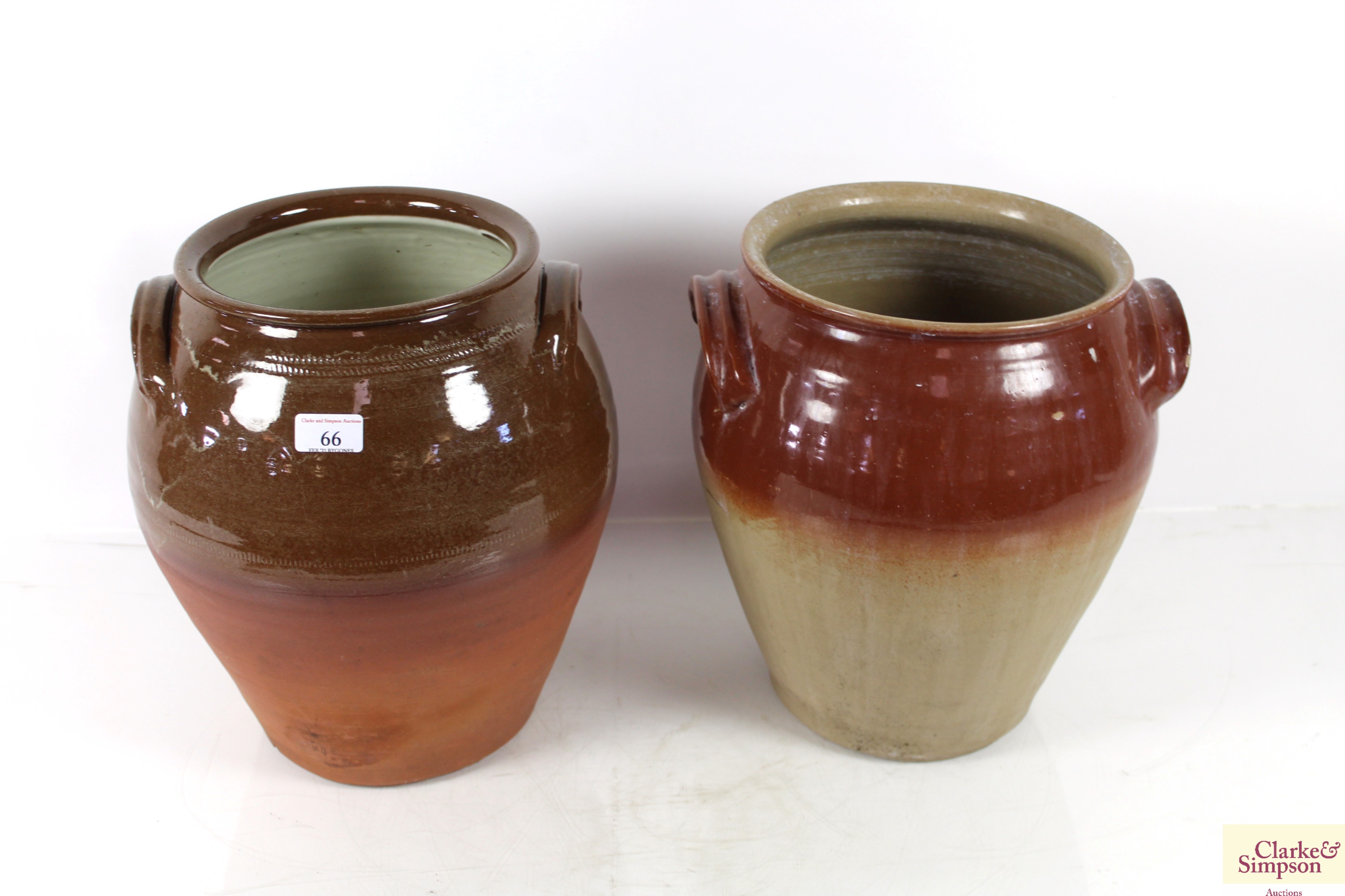 Two stoneware olive jars