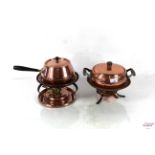 Two copper fondue sets with burners