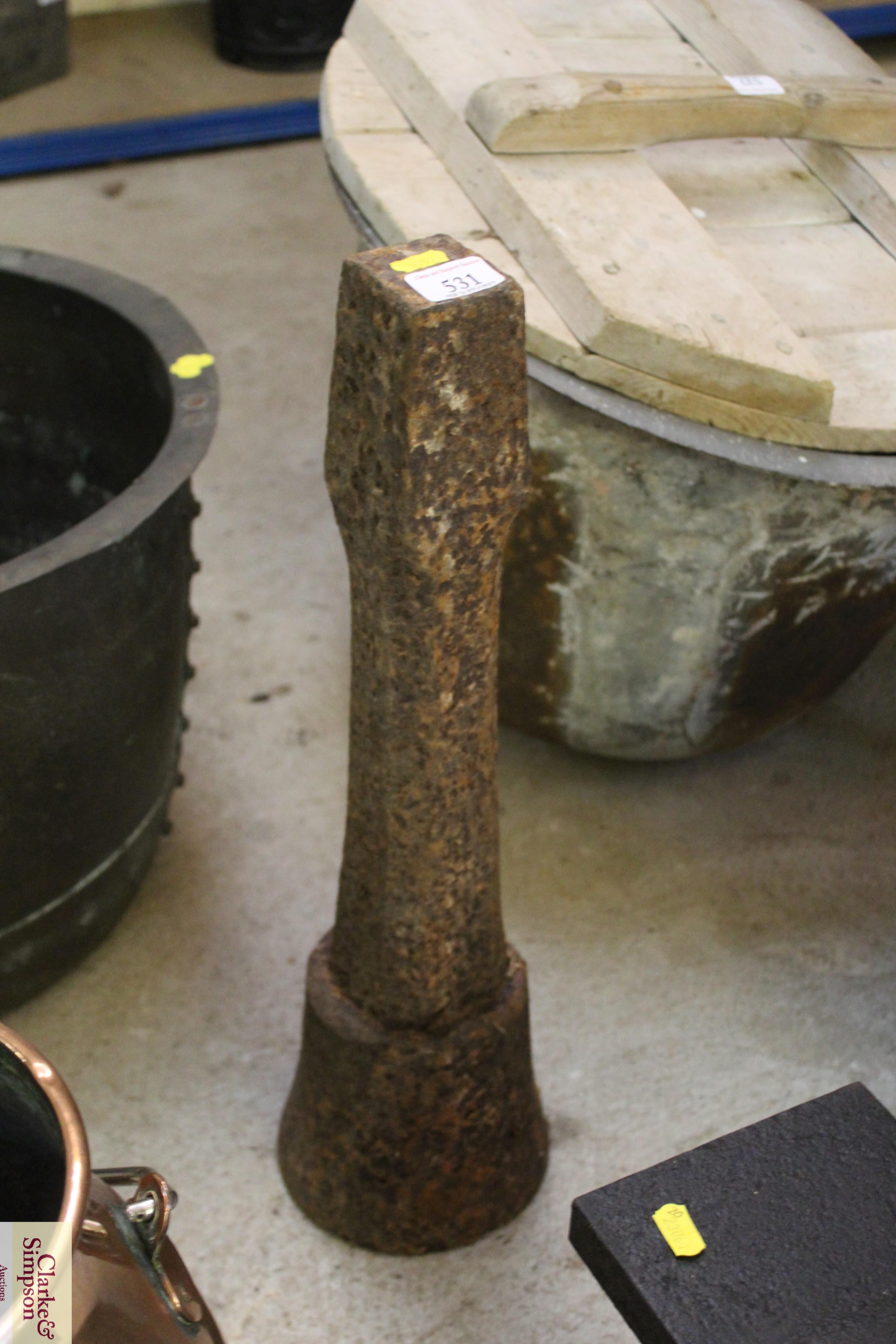 A small cast iron blacksmith's work pillar