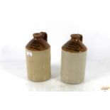 Two stoneware bottles named to Markham Arden & Co. Herb Beer Brewers of Old Palace Road Norwich