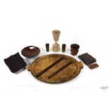 A quantity of antique treen including a food bowl,