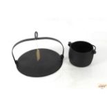 A cooking skillet and a No.4 cast iron cooking pot