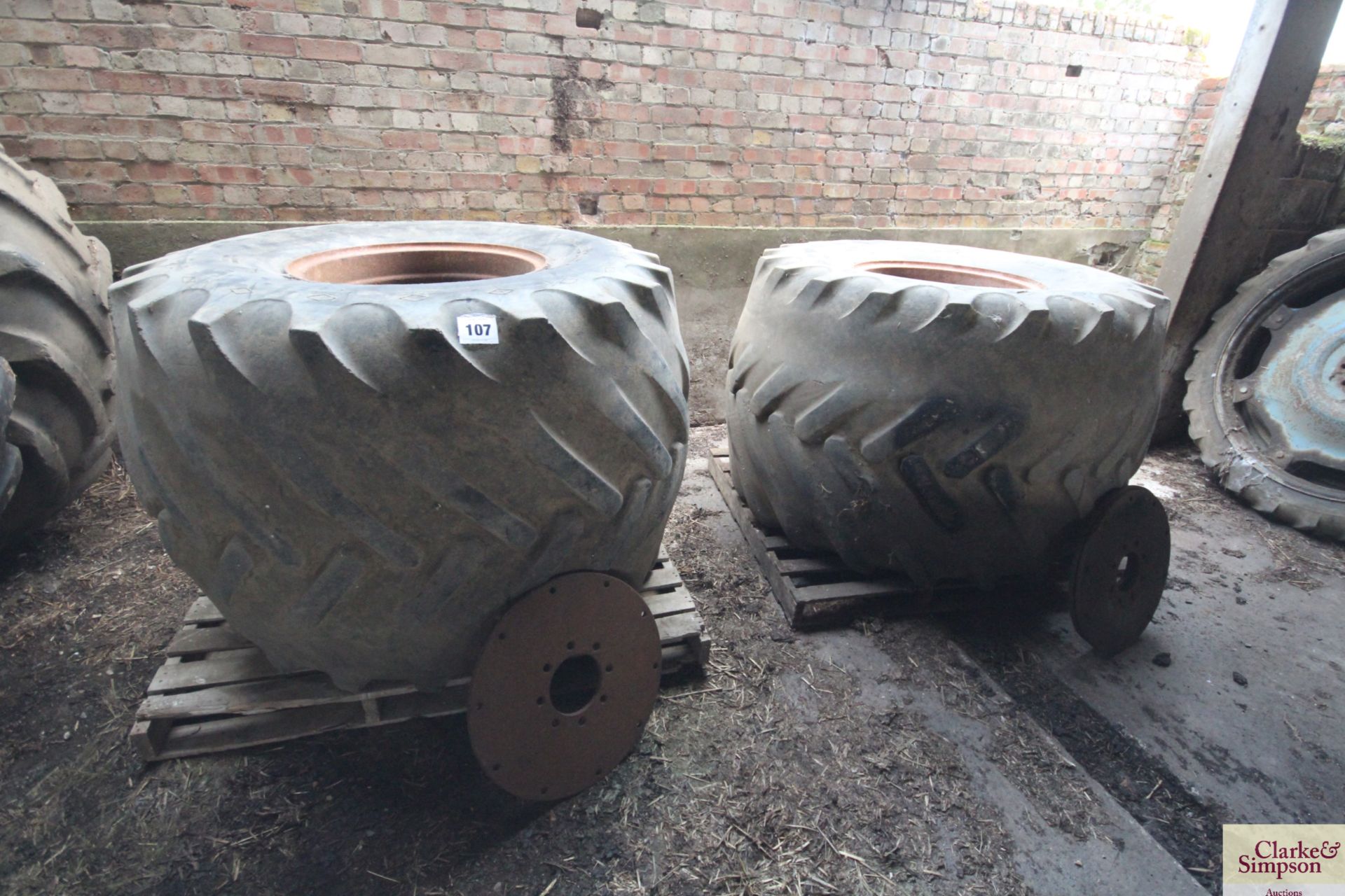 Pair of 66 x 43.00 25 floatation wheels and tyres. With bolt-in centres for New Holland. V