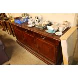 A modern mahogany and cross banded sideboard