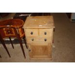 A stripped pine washstand