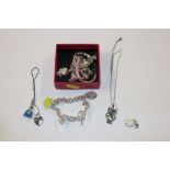 A box of jewellery to include DKNY bracelet, neckl