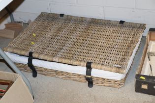 A wicker storage basket