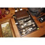 A tray of various cutlery