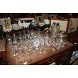 A quantity of various Champagne flutes, a glass d