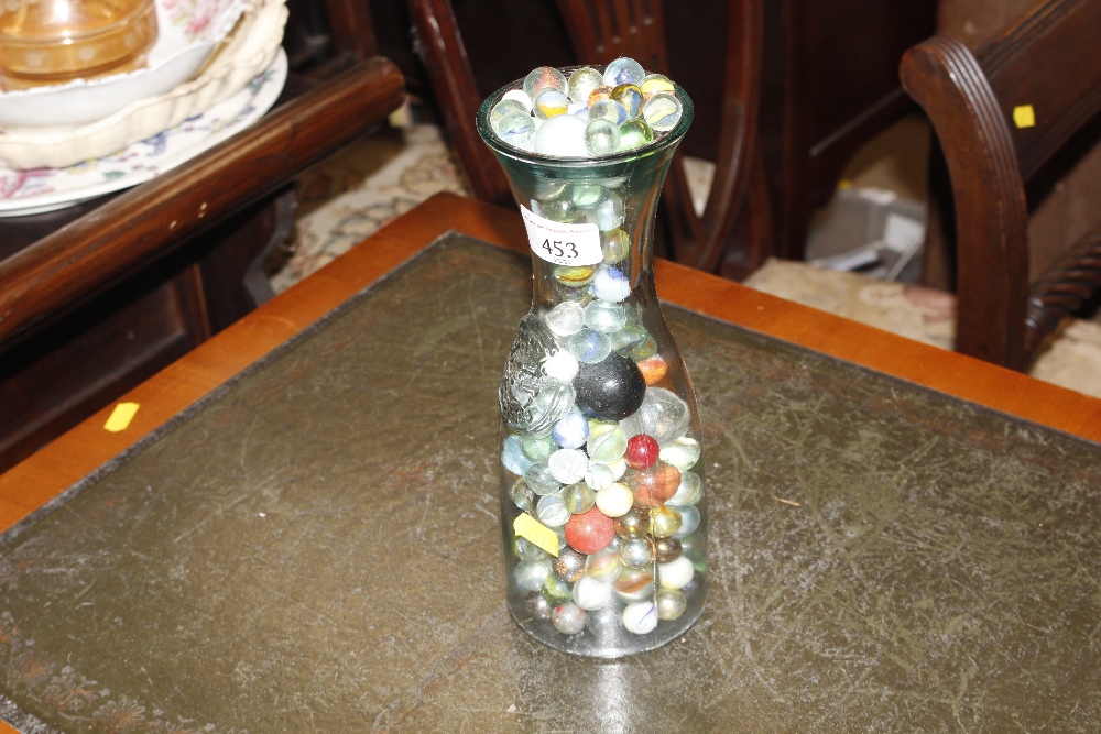 A jar of various marbles