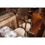 Three upholstered mahogany dining chairs