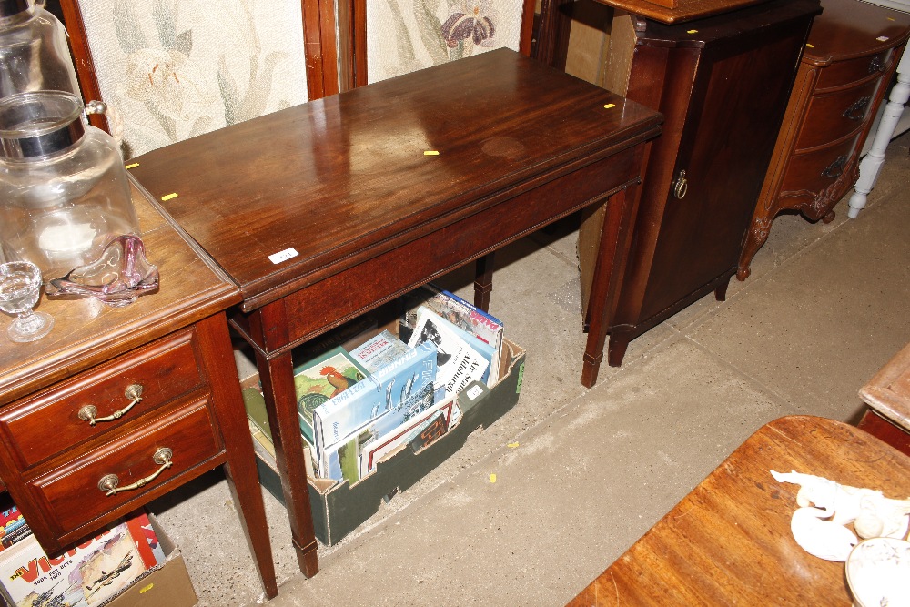 A 19th Century mahogany fold over tea table