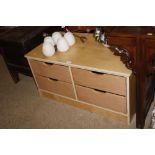A modern four drawer chest