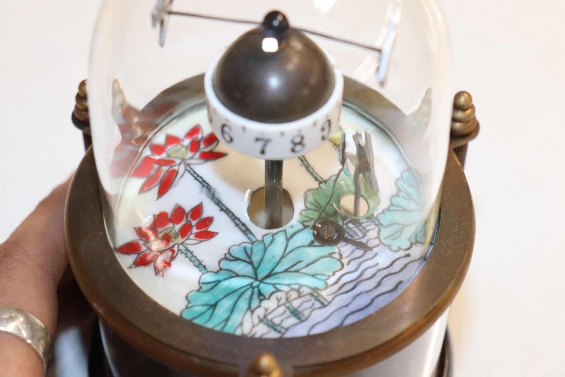 A novelty clock decorated with fish under dome - Image 2 of 3