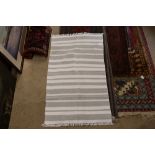 An approx. 2'11" x 5' White Co. cotton striped pat
