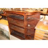 A mahogany open fronted bookcase fitted three shel