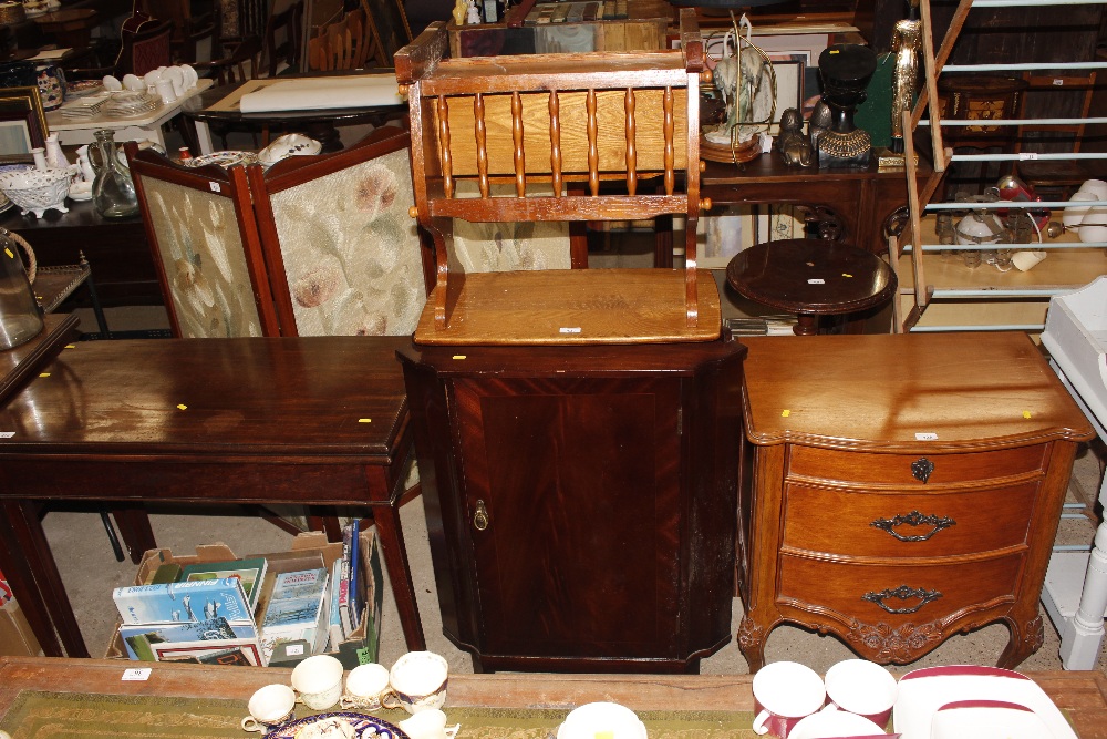 A corner cupboard and a magazine table