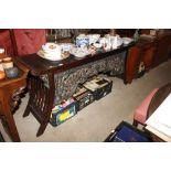 A hardwood alter table with carved decoration