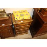 A mahogany and cross banded chest of small proport