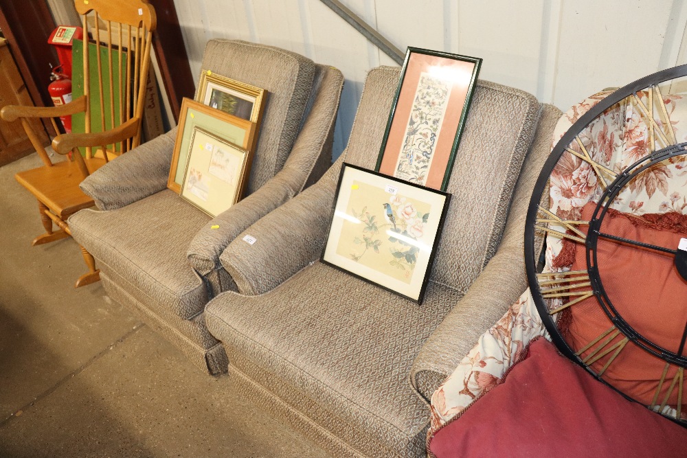 A pair of upholstered armchairs