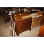 A 19th Century mahogany bureau fitted four graduat