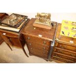 A mahogany chest of small proportions fitted four