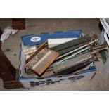 A box containing various music stands and various