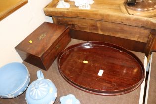 A mahogany lap box; and an oval mahogany tea tray