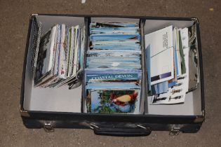 A suitcase and contents of mostly modern post-card