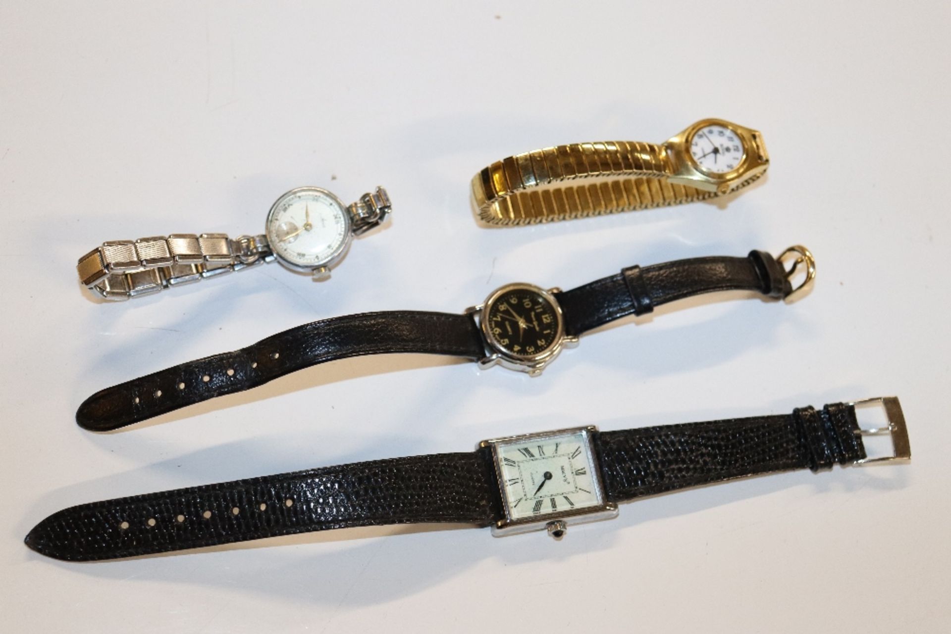 Four various wrist watches