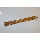 A yellow metal (tested as 18ct gold) bracelet, app