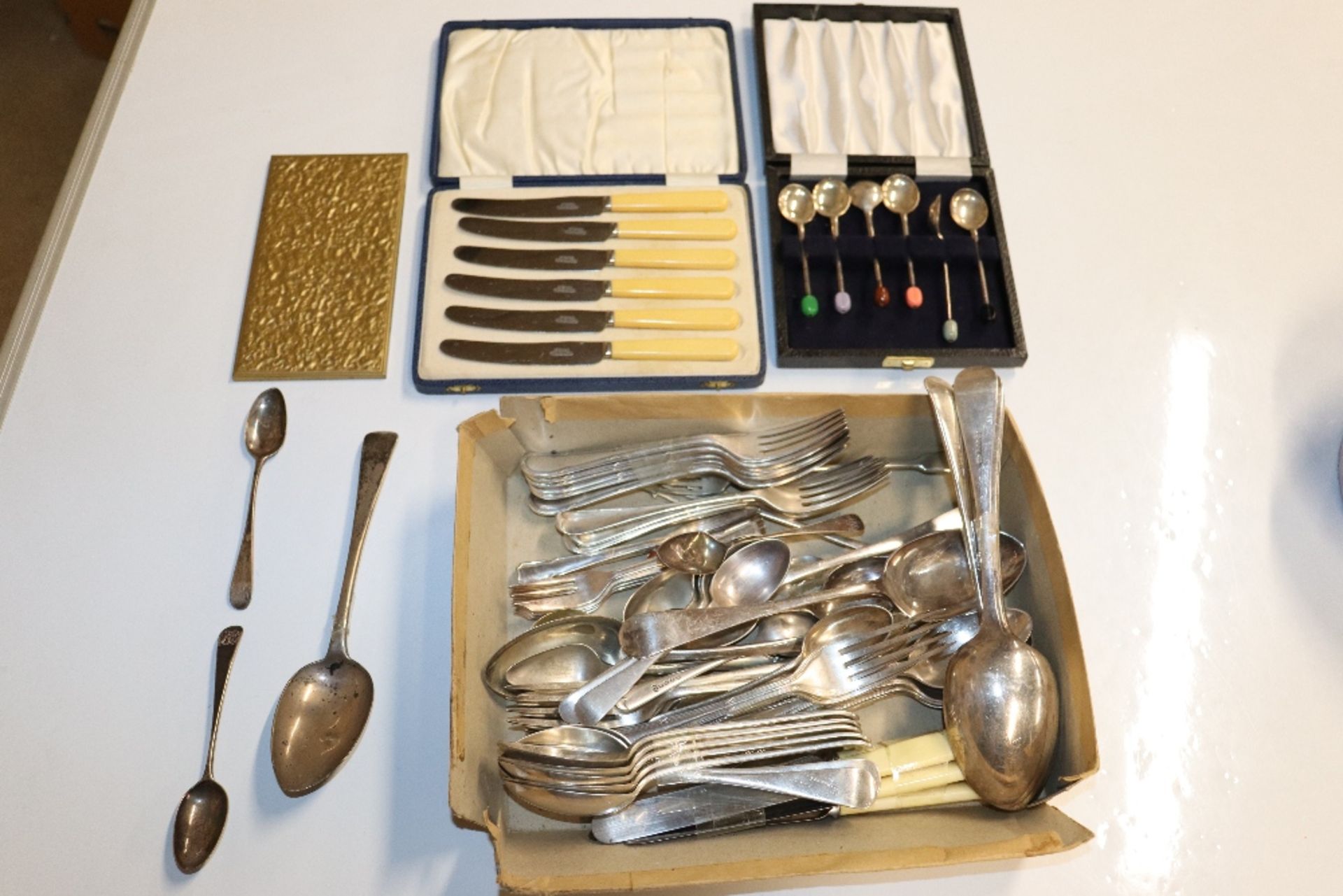 A quantity of various plated cutlery to include a