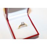 An 18ct gold ring set with approx. ½ct diamond AF