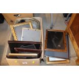 A box of various pictures frames