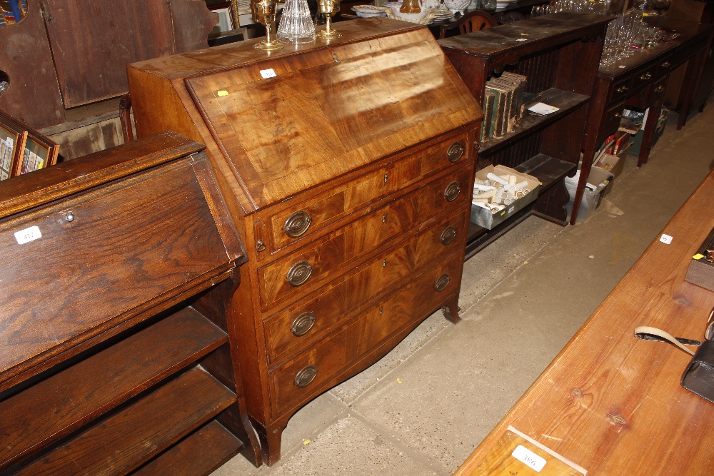 A 19th Century walnut and cross banded bureau fitt