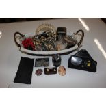 A basket and contents of various costume jewellery